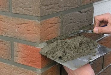 Обработка угла затиркой швов